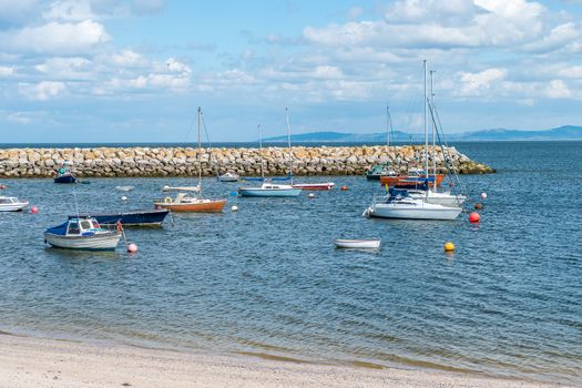 Small boats moored in a small marina