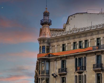 Orange and Yellow Catalun Banner on Old Barcelona Building