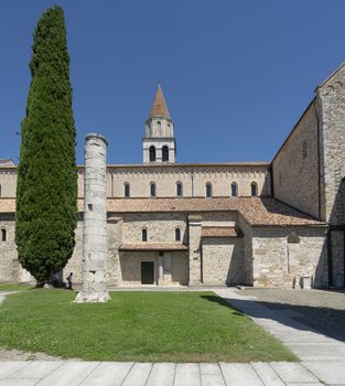 Aquileia, Italy. July 5, 2020 .a Roman column in front of the basilica of Aquileia, Italy