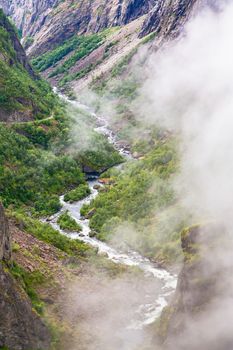 Beautiful view of the Voringsfossen waterfall. Bjoreio river. Norway. Falls in mountains of Norway. Waterfall Voringfossen - the fourth highest peak in Norway. Voringsfossen Waterfall.