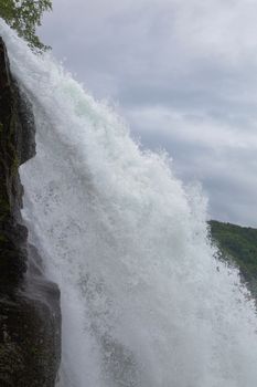 Steinsdalsfossen - one of the gorgeous waterfalls in Norway. Steindalsfossen waterfall in a rainy day.