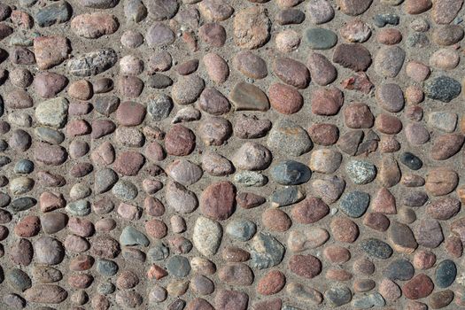 Stone pavement texture background. Cobblestone background. Stone pavement texture.