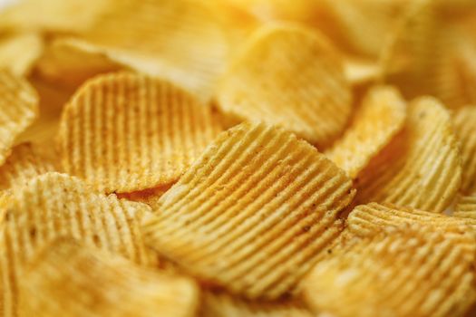 Corrugated Potato Chips. Food background. Top view