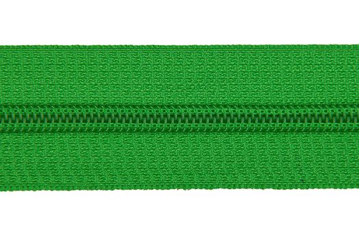 Closed green zipper isolated on white background. Green zipper for tailor sewing. View from above