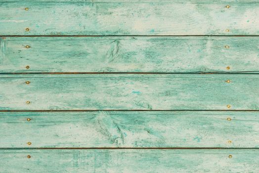 Vintage turquoise colored wooden planks background