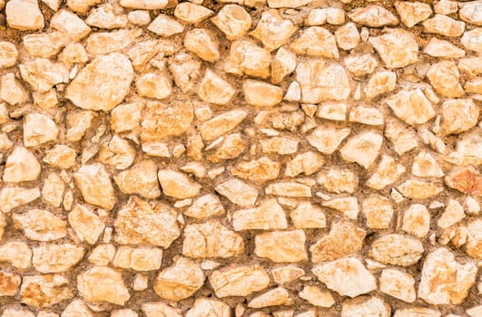Stone wall background texture, structure close-up

