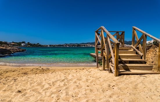 Beautiful sand beach bay in Porto Colom Mallorca, Spain Mediterranean Sea
