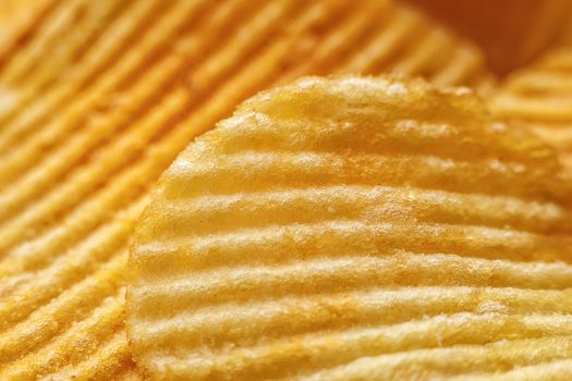 Corrugated Potato Chips. Close-up macro view