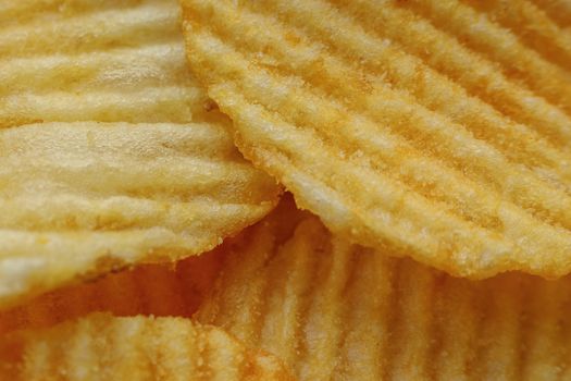 Corrugated Potato Chips. Close-up macro view