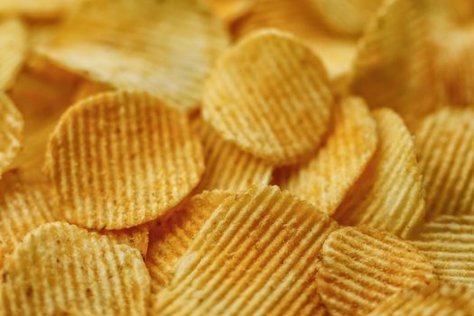 Corrugated Potato Chips. Food background. Top view