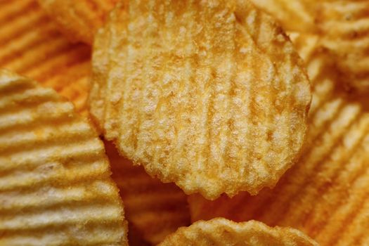 Corrugated Potato Chips. Close-up macro view