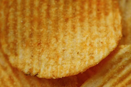 Corrugated Potato Chips. Close-up macro view