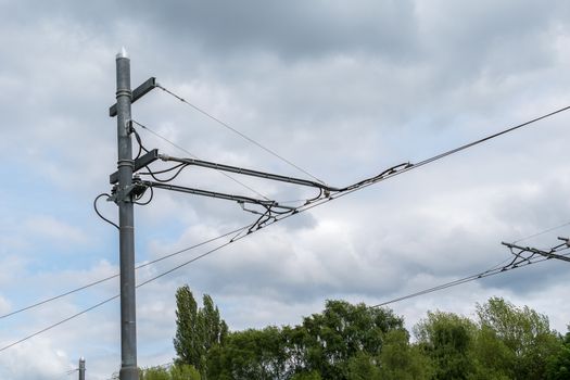 Close up viw of overhead electric wites on a gantry