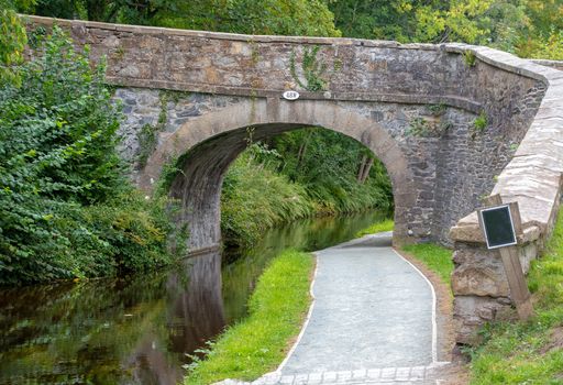 Stone bridge crossing over the Shropshire Union Canal in Llangollen Wales