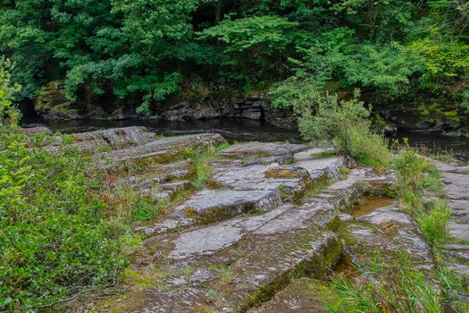 Slate rocks alongside the river Dee in North Wales