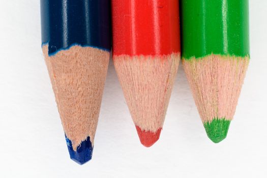 Close up of red, blue and green pencils