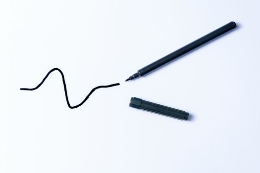 Hand drawn black line and pen isolated on a white background