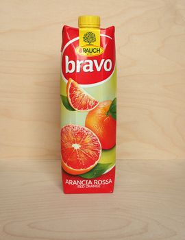 RANKWEIL, AUSTRIA - CIRCA APRIL 2020: Rauch Bravo red orange juice packet