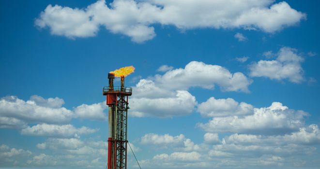 Fuel Fumes burning off at top of an oil rig