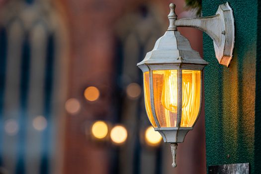 Medieval lanterns with spruce branches at Christmas market. Riga, Latvia - image