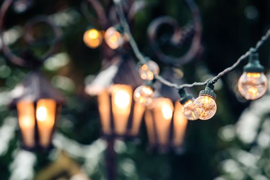 Girland at Christmas market, Christmas tree background, selective focus, Riga, Latvia - image