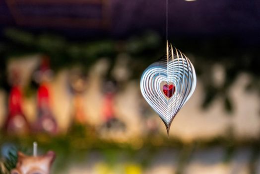 Metal festive decorations on a blurry background, selective focus - image