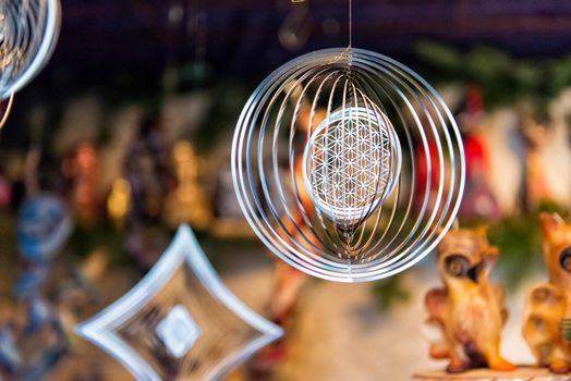 Metal festive decorations on a blurry background, selective focus - image