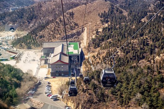 BADALING, CHINA - MARCH  13, 2016: Great Wall of China. A cable car taking visitors up to the Great Wall of China.