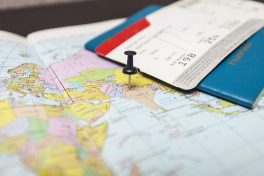 World map, passport and air tickets