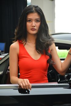 TAGUIG, PH - JULY 13 - Rolls Royce female model at Rolls Royce car showroom on July 13, 2019 in Bonifacio Global City, Taguig, Philippines.