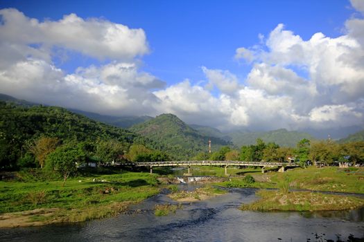 River landscape flows down through the Khiriwong village in Thailand.