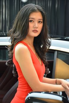 TAGUIG, PH - JULY 13 - Rolls Royce female model at Rolls Royce car showroom on July 13, 2019 in Bonifacio Global City, Taguig, Philippines.