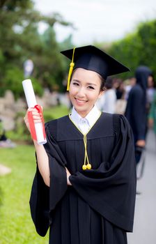 Happy graduated student girl, congratulations - graduate education success - concept education.