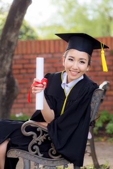 Happy graduated student girl, congratulations - graduate education success - concept education.