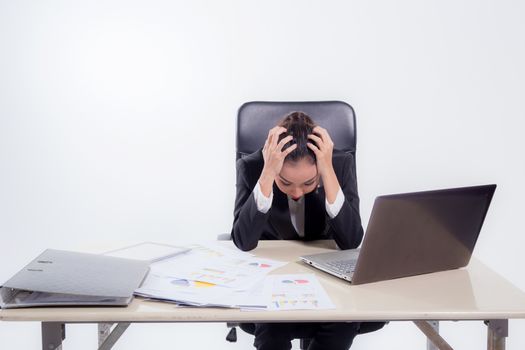 working woman are stressed from pile of work  in front of her in work concept - asian woman stressful job concept.