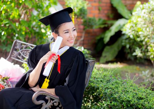 Happy graduated student girl, congratulations - graduate education success - concept education.