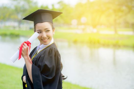 Happy graduated student girl, congratulations - graduate education success - concept education.