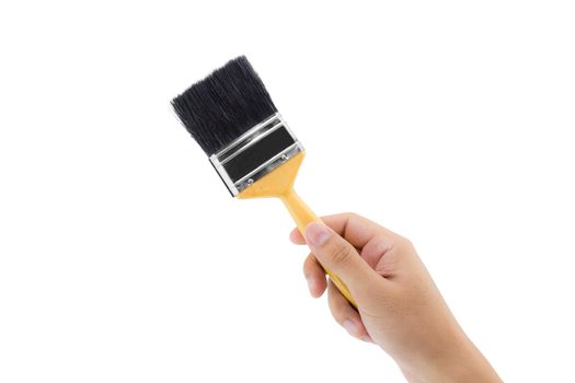 man hand with paint brush with wood handle isolated on a white background.