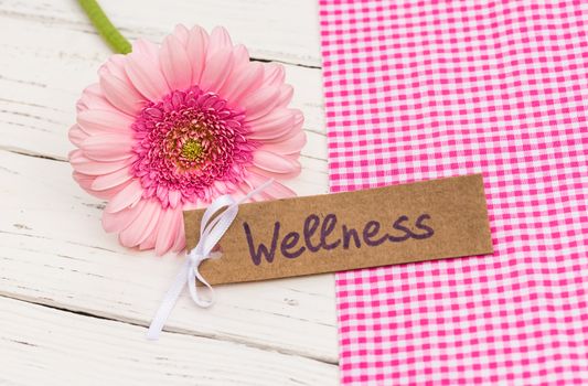 Gift card for wellness with beautiful pink flower