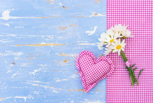 Romantic Valentine's day background with pink heart and bouquet of flowers