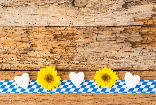 Traditional beer festival celebration Oktoberfest background with rustic wood and bavarian pattern