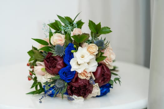 Decorative bouquet of fresh flowers to decorate the festive table.
