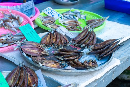 Fresh seafood on the counter at the fish market by the ocean