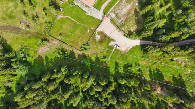 Overhead aerial view of beautiful mountain trees in summertime.