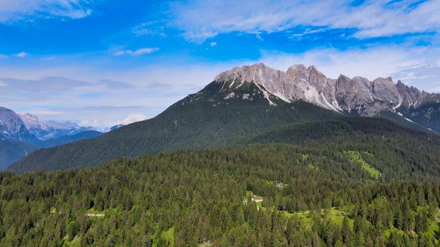 Alpin landscape with beautiful mountains in summertime, view from drone.