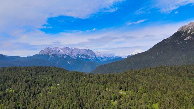 Alpin landscape with beautiful mountains in summertime, view from drone.