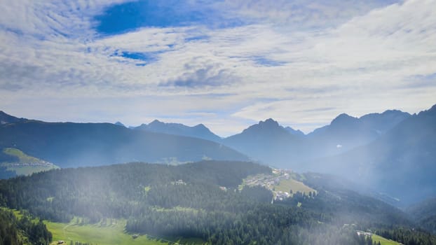 Alpin landscape with beautiful mountains in summertime, view from drone.