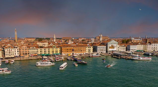 Many Colorful Ferries in Canal in Venice