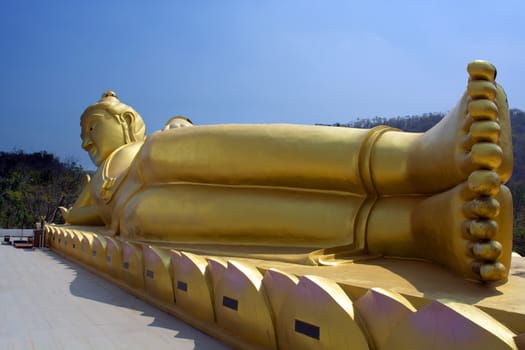 Reclining Buddha is another form of Buddhist art that can be seen in Thai ntemples.