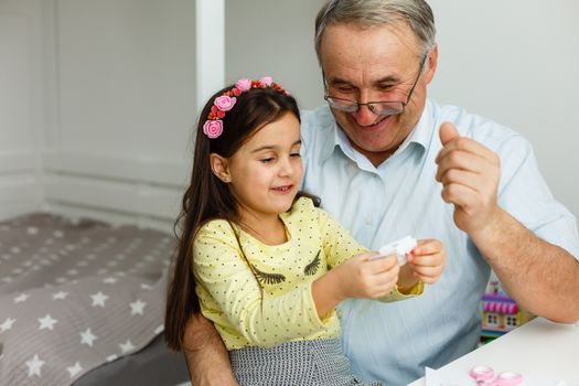 Grandfather meeting his cute granddaughter.